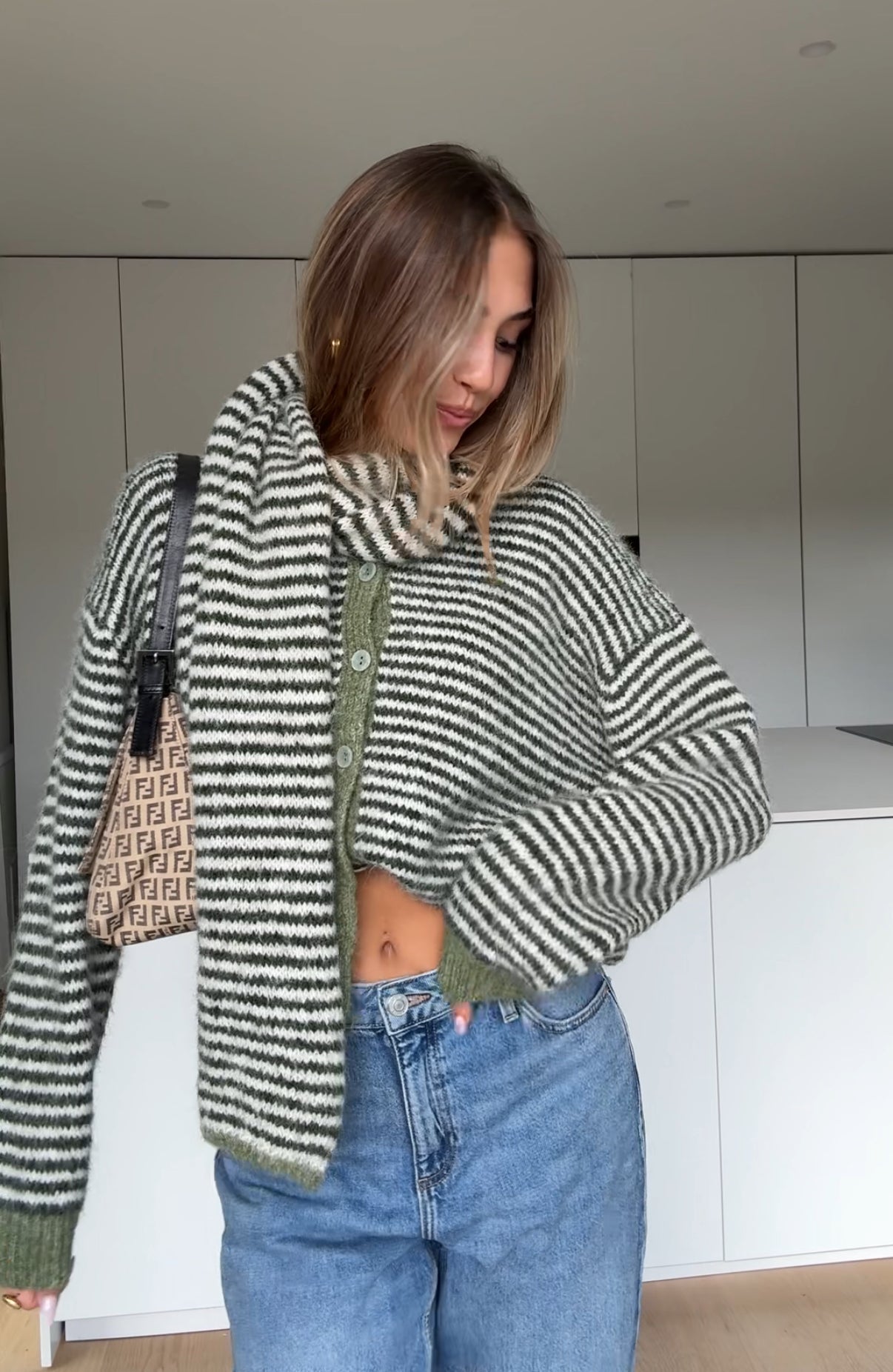 Soft striped cardigan in a muted color