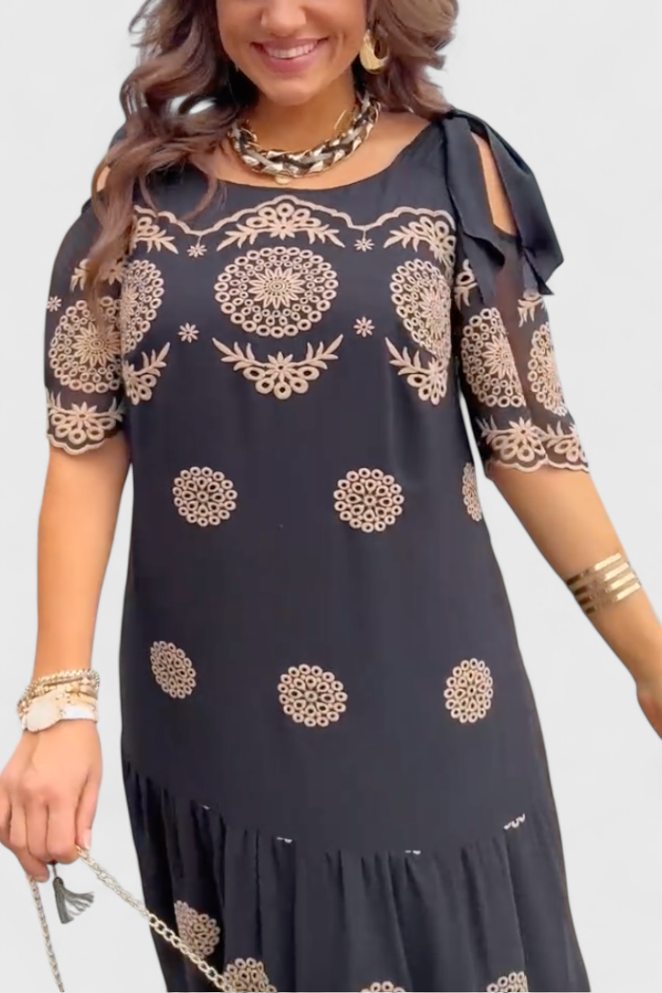 Cathy Elegant Summer Dress in Net with Openings and a Flowing Line