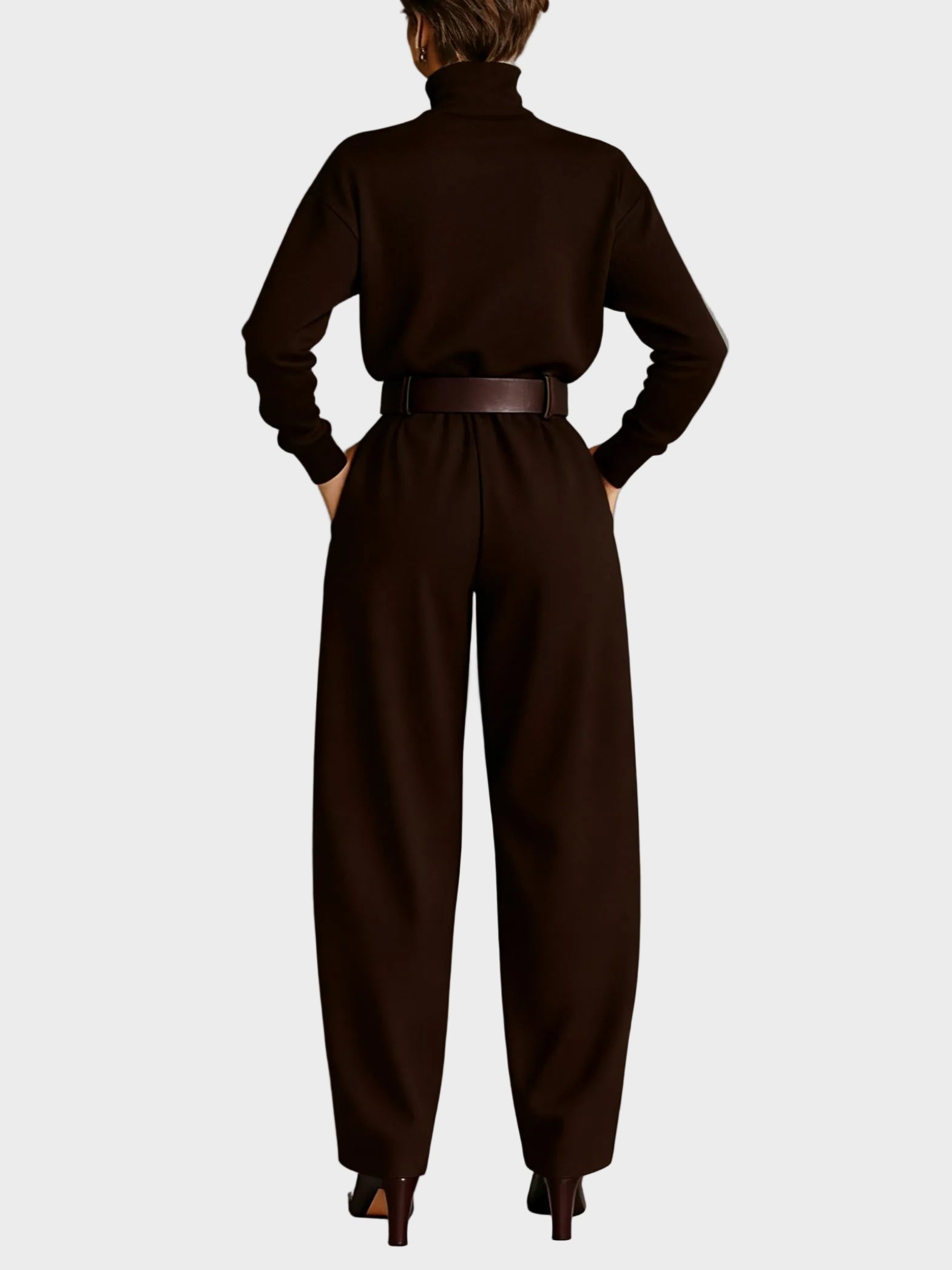 Amara | Two-piece set with a solid black long-sleeve turtleneck top and straight-leg trousers.