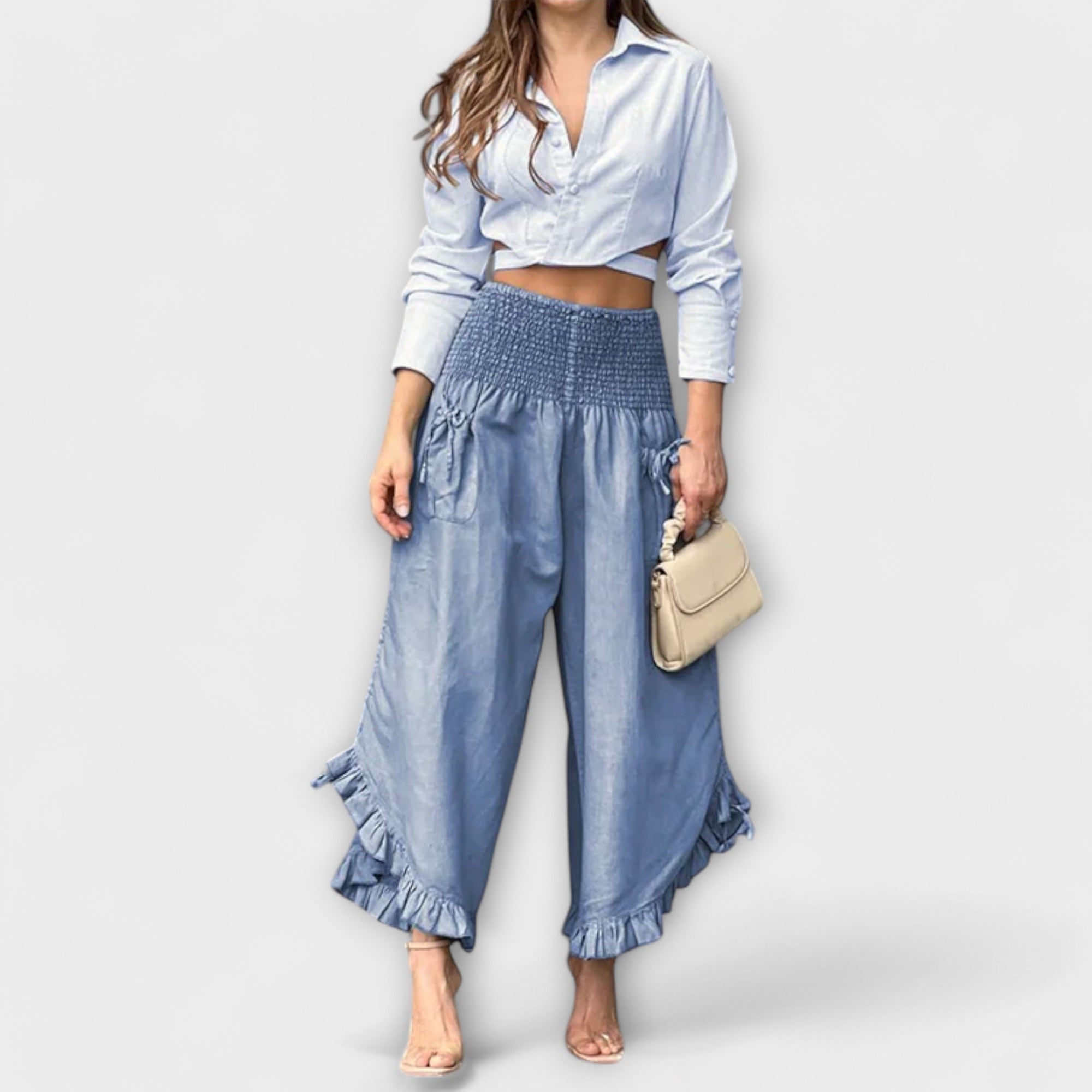 Jaya - Loose linen trousers with modern pleats