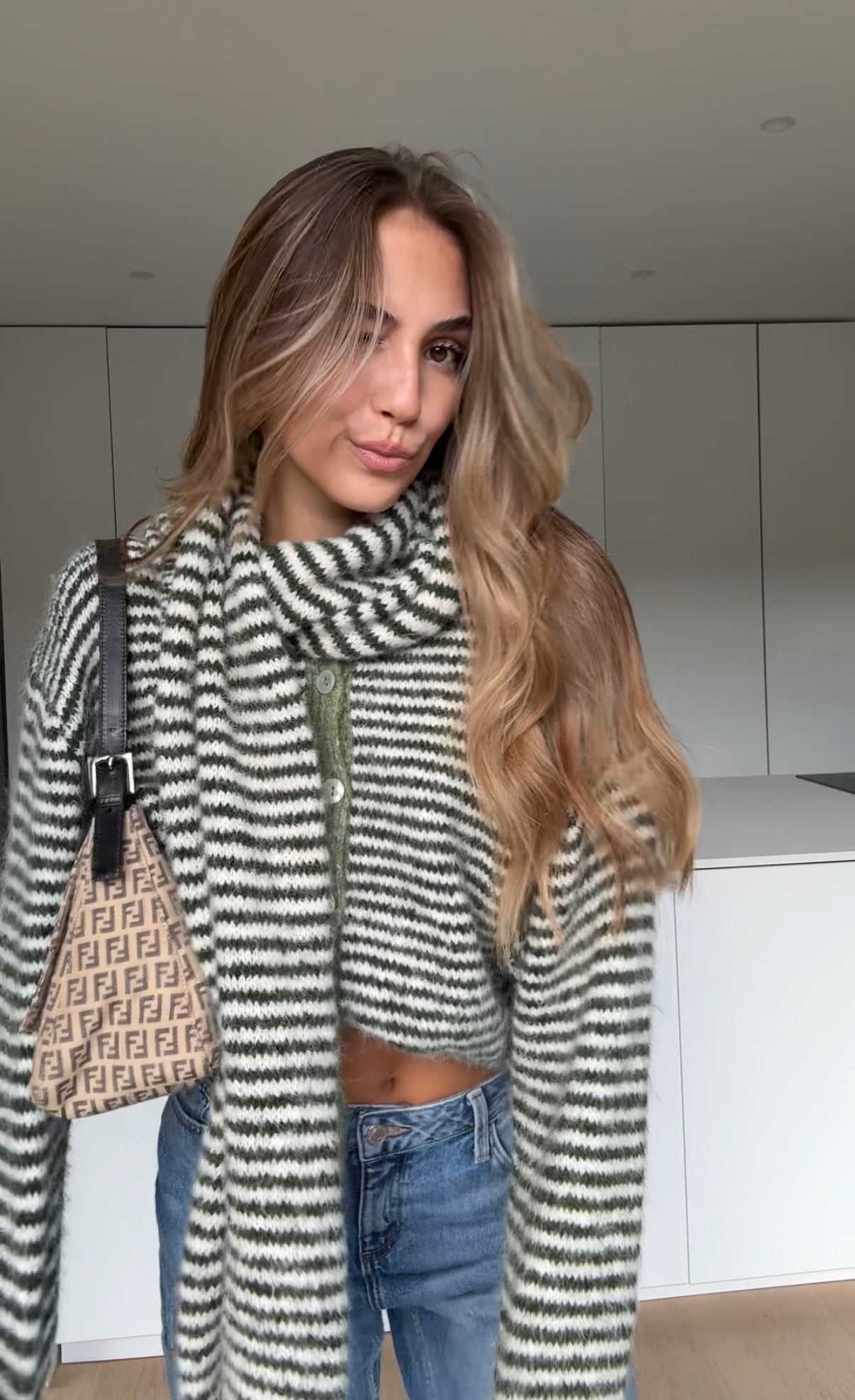 Soft striped cardigan in a muted color