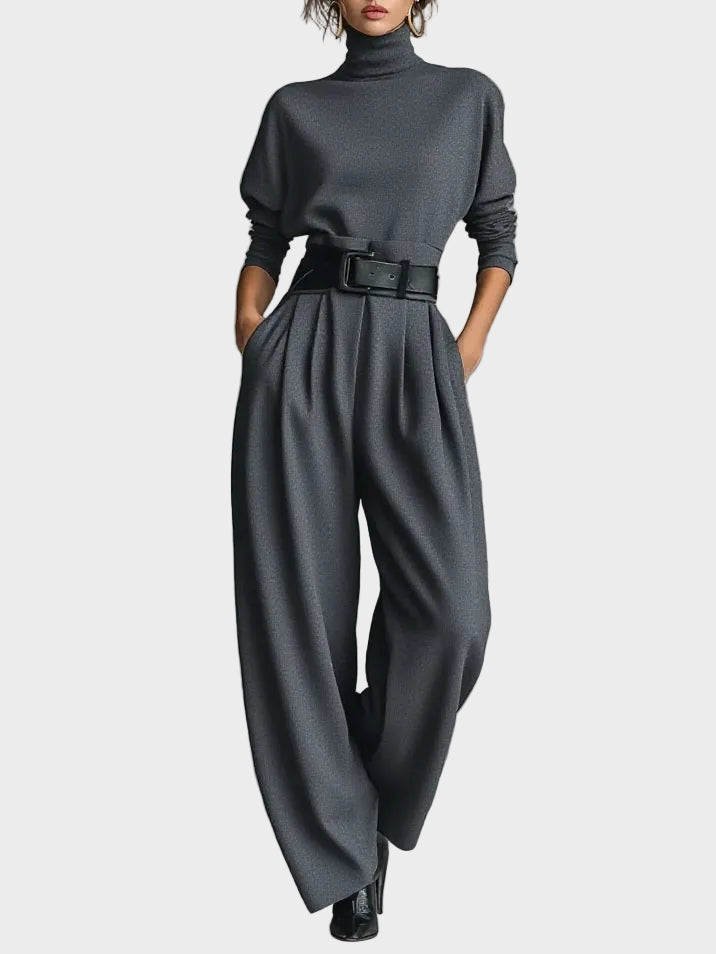 Amara | Two-piece set with a solid black long-sleeve turtleneck top and straight-leg trousers.